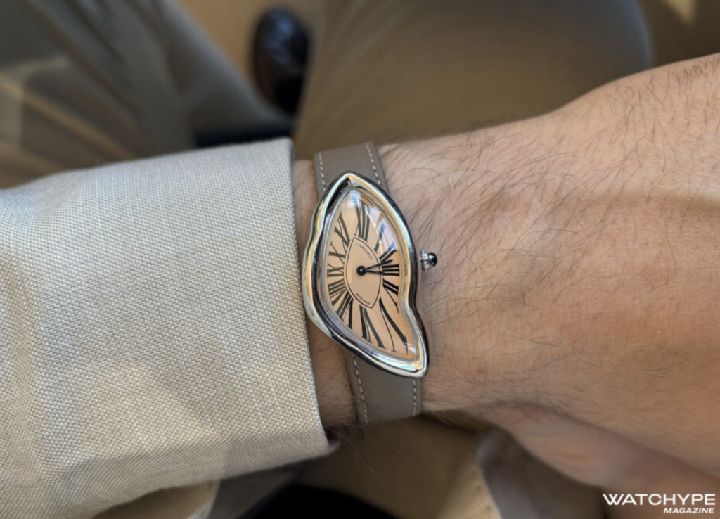 Lot 101 from Phillip's auction, Cartier crash in white gold with salmon dial